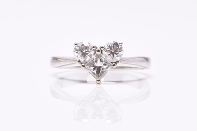 Lot 43 - A three stone heart shaped diamond ring