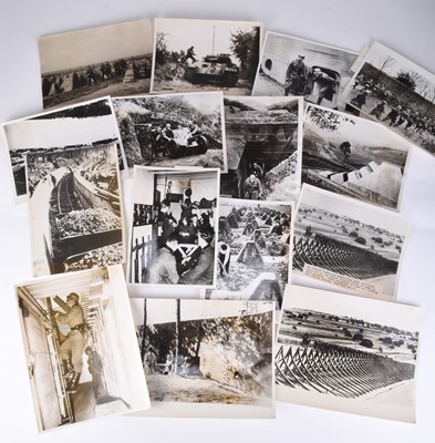 Lot 12 - Fifteen press photographs relating to the Siegfried Line, WW2