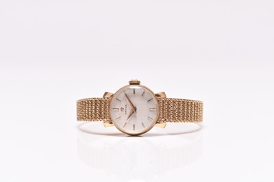 Lot 95 - Omega: A lady's 9ct gold bracelet watch