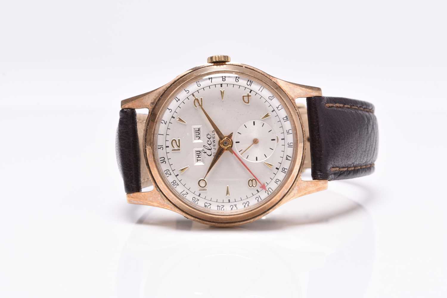 Lot 450 - Elco: A gentleman's 9ct gold calendar wristwatch