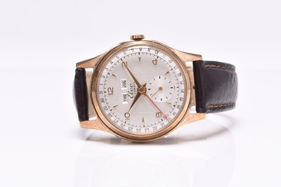 Lot 450 - Elco: A gentleman's 9ct gold calendar wristwatch