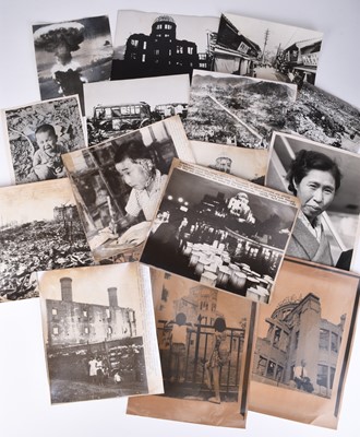 Lot 13 - PRESS PHOTOGRAPHS. Atomic bombings of Hiroshima and Nagasaki.