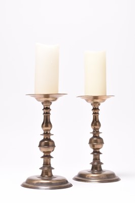 Lot 148 - A pair of 17th century French pricket candlesticks