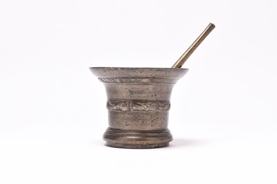 Lot 202 - A mid 17th century bronze mortar and pestle, English circa 1640