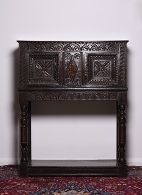 Lot 120 - A good Charles I oak livery cupboard