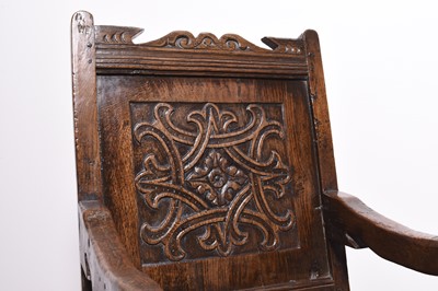 Lot 168 - A mid 17th century oak 'wainscot' armchair, Lake District