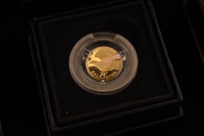 Lot 273 - London Mint "Fabula Aurum". A cased set of 12 pure 24 carat gold coins