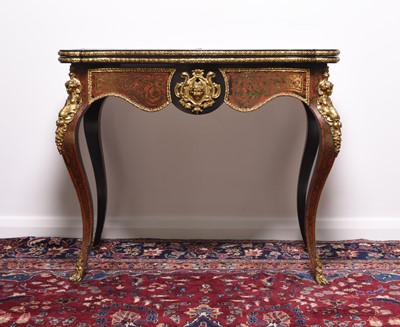 Lot 253 - A French ebonised, red tortoiseshell, inlaid cut brass and gilt metal mounted 'Boulle' card table