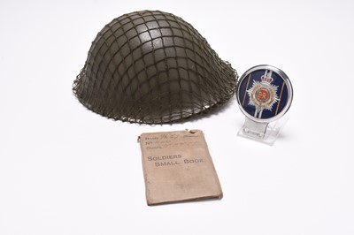 Lot 184 - British Army MKIV helmet, WW1 soldier's small book and RASC car badge