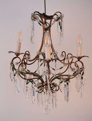 Lot 610 - A pair of Venetian glass and gilt metal chandeliers