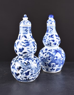 Lot 33 - A near pair of Chinese porcelain vases and covers, 19th century