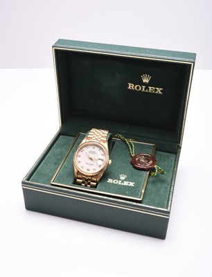 Lot 103 - Rolex: A gentleman's 18ct gold Oyster Perpetual Datejust bracelet watch