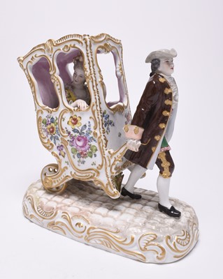 Lot 218 - Marc Eugene Clauss (Paris) porcelain model of a footman pulling a lady in a sedan