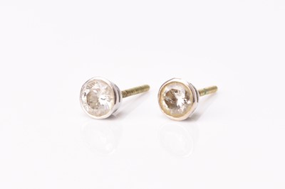 Lot 152 - A pair of diamond stud earrings