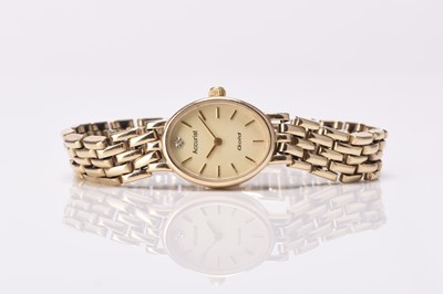 Lot 312 - Accurist: A lady's 9ct gold bracelet watch