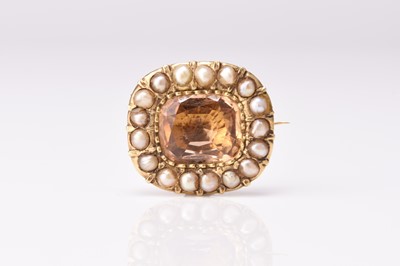 Lot 201 - A 19th century citrine and half seed pearl set brooch