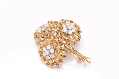 Lot 73 - A Tiffany & Co diamond set triple flower spray brooch