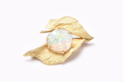 Lot 74 - An opal set brooch