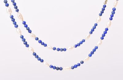 Lot 182 - A single strand lapis lazuli and freshwater pearl necklace