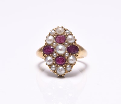 Lot 80 - A late 19th century untested split pearl and ruby set ring