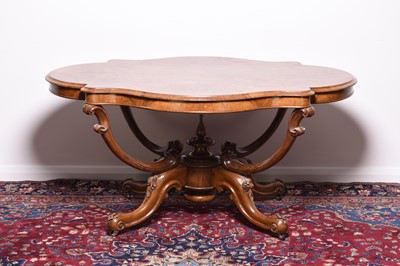 Lot 245 - A Victorian burr walnut 'basket base' centre table