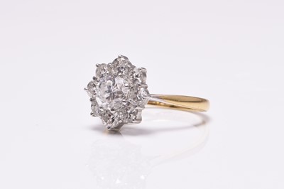 Lot 63 - An 18ct gold diamond floral cluster ring