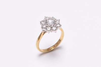 Lot 63 - An 18ct gold diamond floral cluster ring