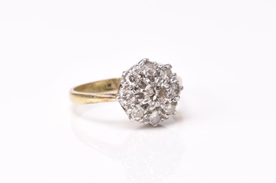 Lot 270 - A circular diamond cluster ring