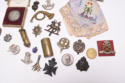 Lot 189 - Militaria including trench lighter, cap badges, sweetheart's handkerchief, etc