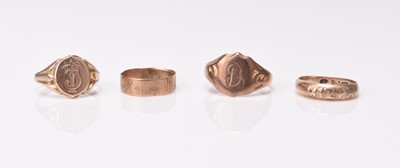 Lot 118 - A collection of four 9ct rose gold rings