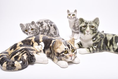 Lot 194 - A group of four Winstanley studio pottery models of cats