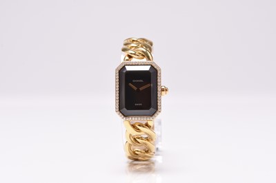 Lot 91 - Chanel: A lady's 18ct gold diamond set Premiere bracelet watch