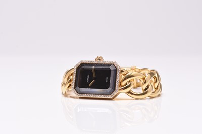 Lot 91 - Chanel: A lady's 18ct gold diamond set Premiere bracelet watch