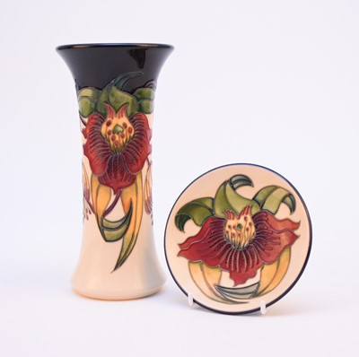 Lot 202 - A Moorcroft 'Anna Lily' vase and matching coaster, designed by Nicola Slaney