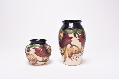 Lot 208 - Two Moorcroft vases in the 'Anna Lily' pattern, 21st century