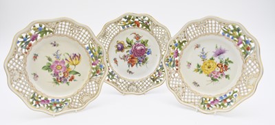 Lot 163 - Three Dresden reticulated plates and a group of English jugs