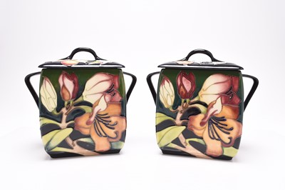 Lot 124 - Two Moorcroft 'Pencarrow' biscuit jars and covers