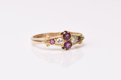 Lot 204 - An early 20th century 18ct gold ruby and diamond ring