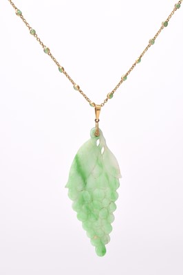 Lot 261 - A jade plaque pendant on chain