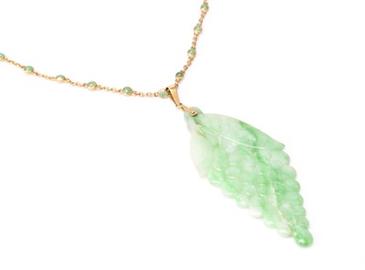 Lot 261 - A jade plaque pendant on chain
