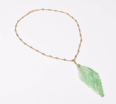 Lot 261 - A jade plaque pendant on chain