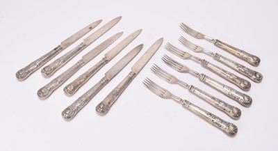 Lot 19 - A matched set of silver fruit knives or forks