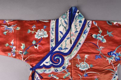Lot 187 - A Chinese silk embroidered child's robe, Qing Dynasty