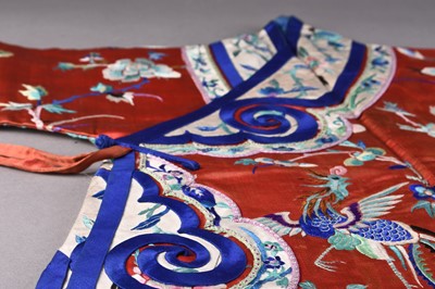 Lot 187 - A Chinese silk embroidered child's robe, Qing Dynasty
