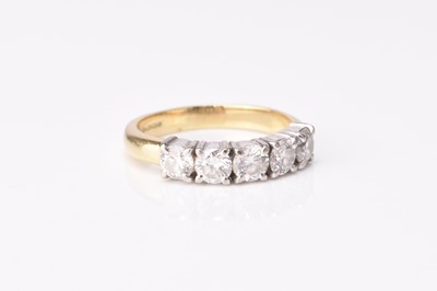 Lot 274 - An 18ct gold five stone diamond ring