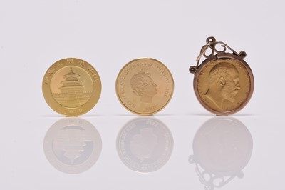 Lot 237 - Edward VII sovereign dated 1904 within 9ct gold pendant mount