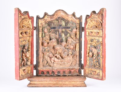 Lot 145 - A 17th century polychrome and parcel gilt gesso and carved wood triptych, Portuguese or Spanish