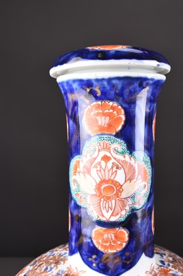 Lot 201 - A pair of Japanese Imari vases and covers, Meiji era
