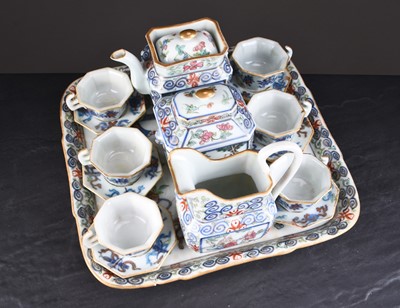 Lot 66 - A Chinese Doucai style miniature cabaret tea service, Qing Dynasty