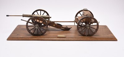 Lot 85 - A scale model Napoleonic field cannon with shot carriage, on wood display stand